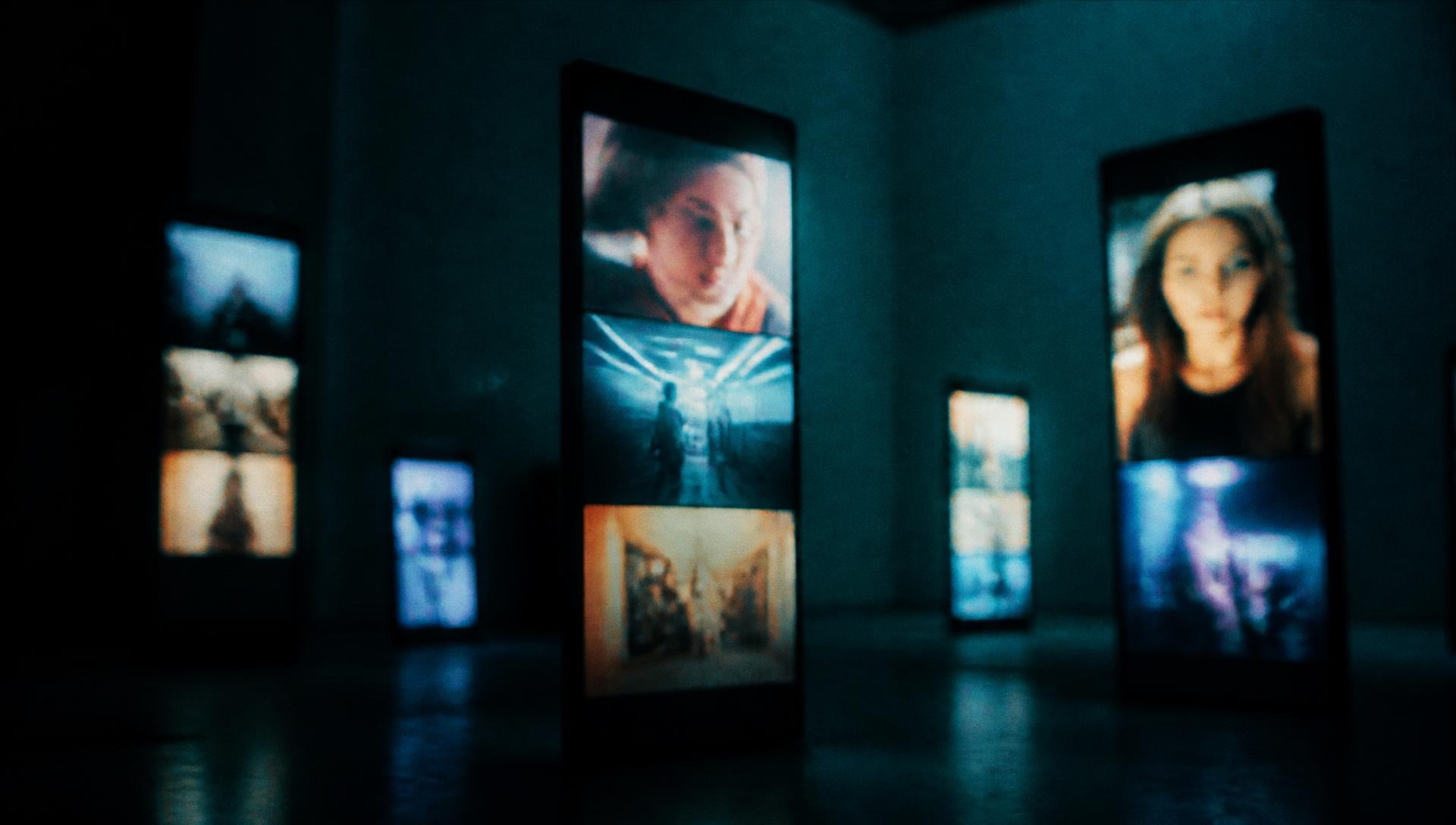 Vertical creator videos glowing in a dark studio